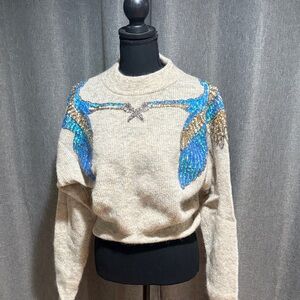 H&M Beige Crewneck Sweater with Blue and Gold Embellished Wings